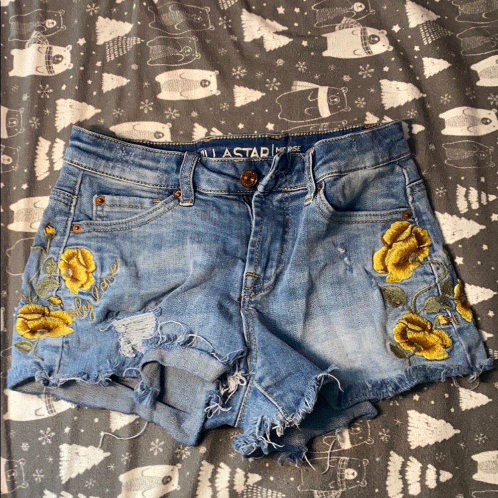 Flower embroidered jean shorts